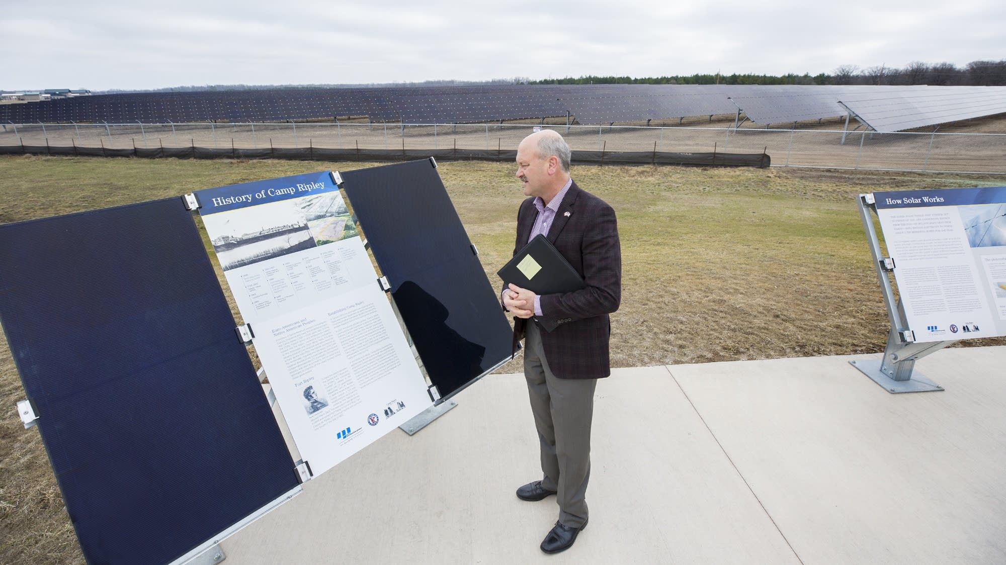 Al Hodnik visits a solar panel dislplay