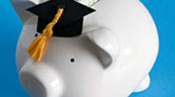 Piggy bank with mortarboard