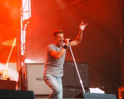 the band 311 performing on stage