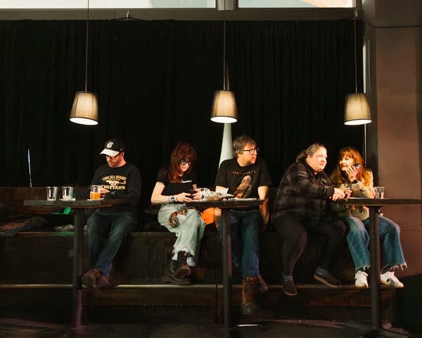 Music fans take in a performance at a music venue