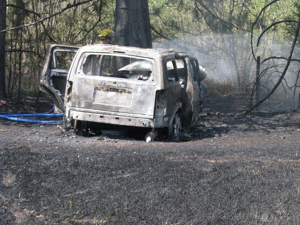 Passersby credited with saving woman from fiery crash