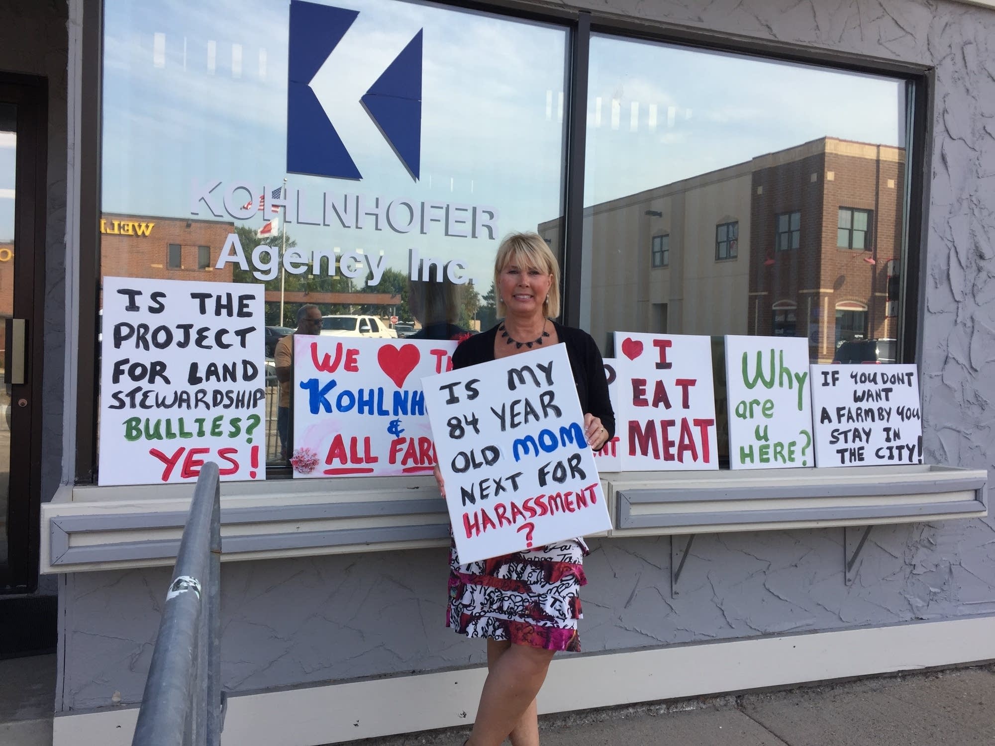 Beth Kohlnhofer Raskovich stands by her insurance agency in Lakeville