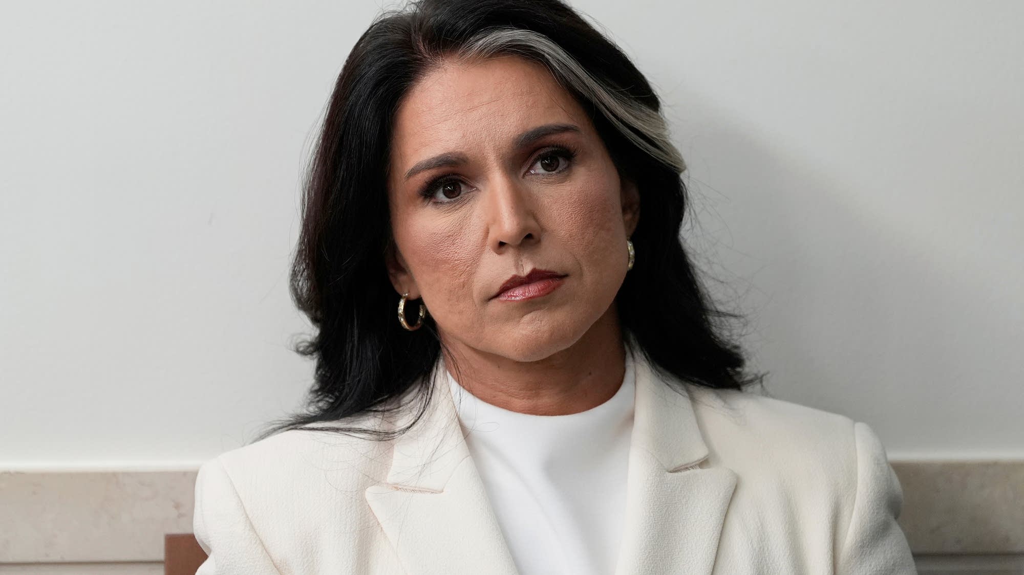 Tulsi Gabbard resigns as director of national intelligence, citing her husband's health