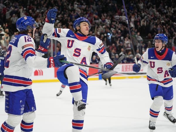 A hockey player celebrates a goal