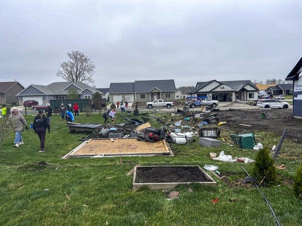 Residents and volunteers begin cleanup efforts