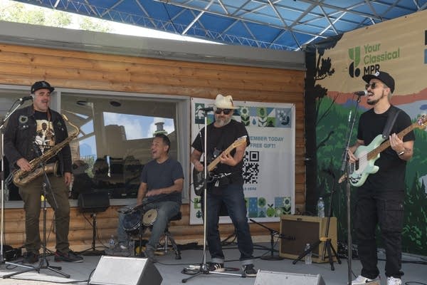 Ozomatli perform at the MPR booth at the Minnesota State Fair