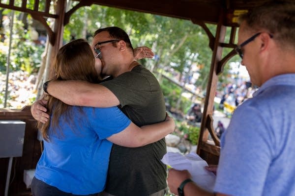 Two people kiss