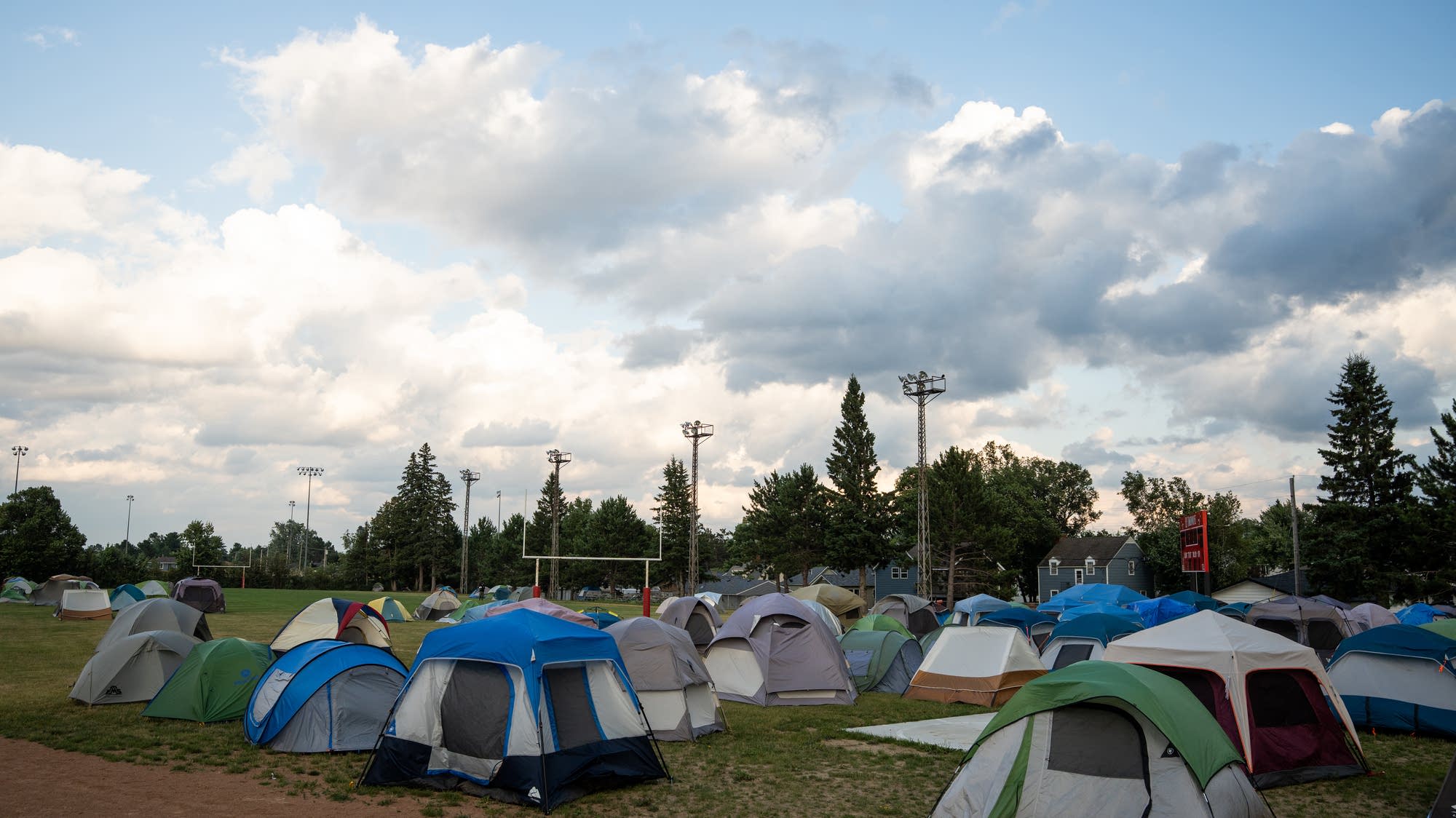 Wildland firefighters from around the country set up camp at Ely high school