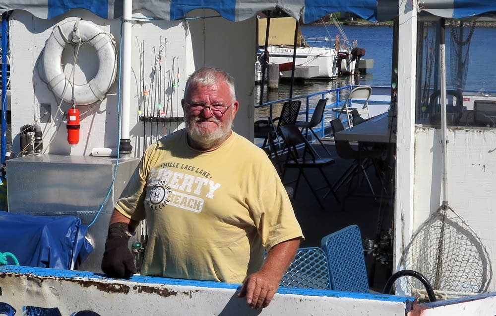 Dickie Gadbois stood on his fishing launch.