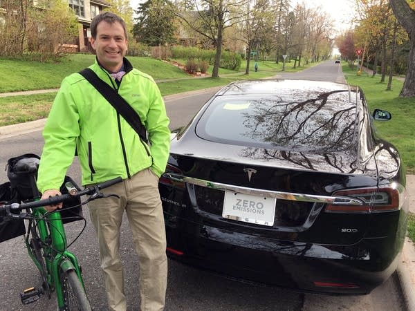 Duluth physician Andrew Nisbet shows off his new electric Tesla sedan.