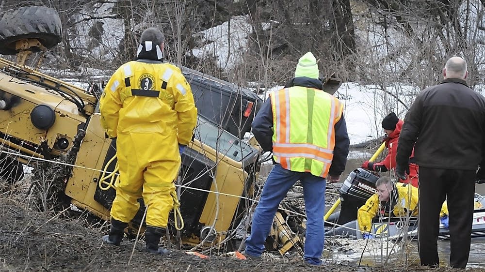 MnDOT IDs worker whose backhoe was swept away MPR News