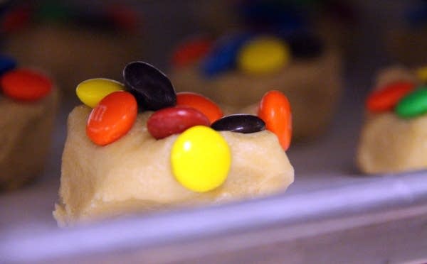 M&M cookies wait to go into the oven.