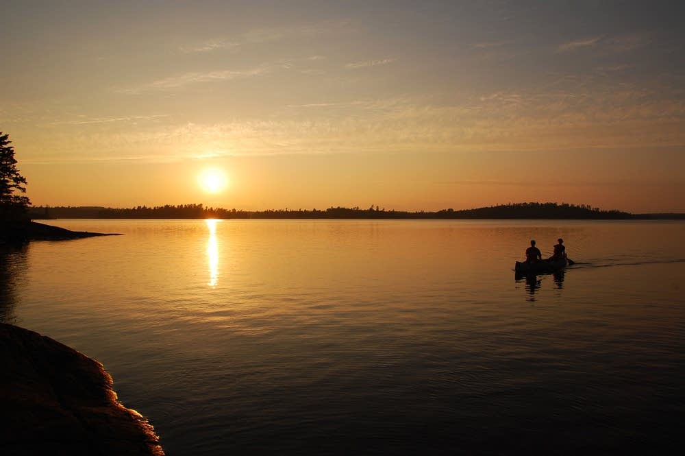 Canoeing at sunset
