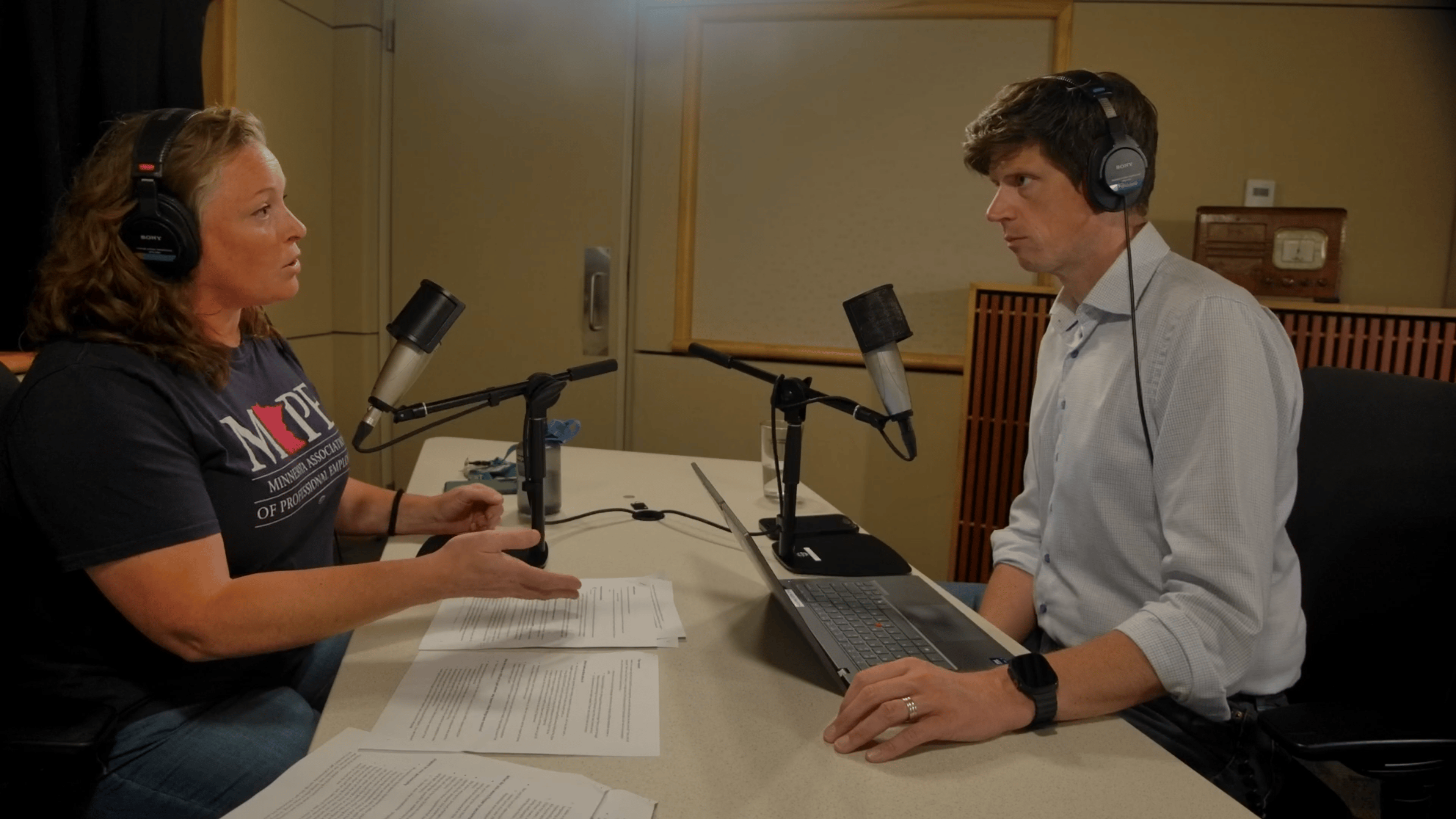 Megan Eiting, MAPE representative and DNR firefighter, speaks with MPR News host Clay Masters