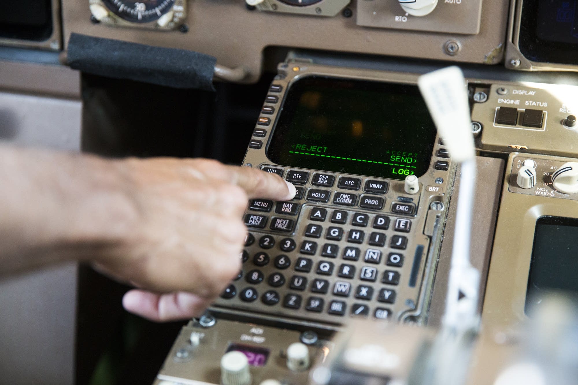 A Delta Airlines pilot demonstrates the FAA's NextGen Data Comm system.