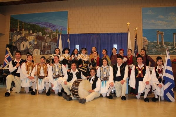 A group of dancers pose together