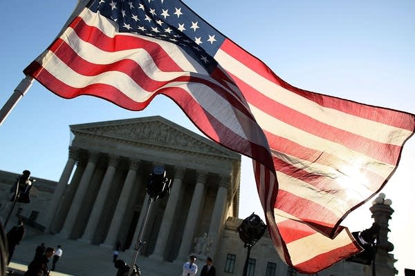 A protester's flag at the Supreme Court