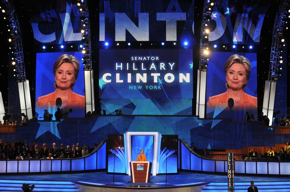 Hillary Clinton takes the podium at the DNC