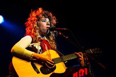 Meels performing on stage