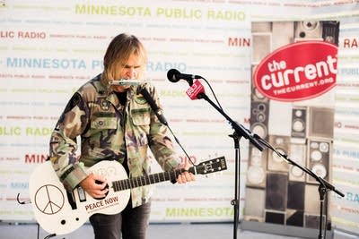 Mike Peters of the Alarm at the MPR booth