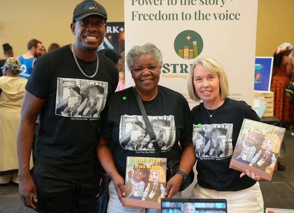 Derek Francis with his children's book