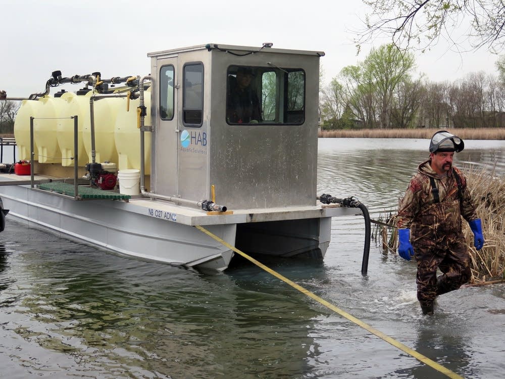 Barge preps for alum treatment.