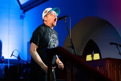 Man singing into microphone