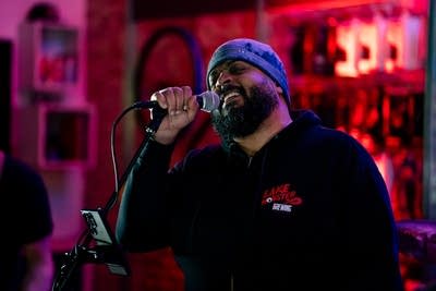 Man singing into microphone