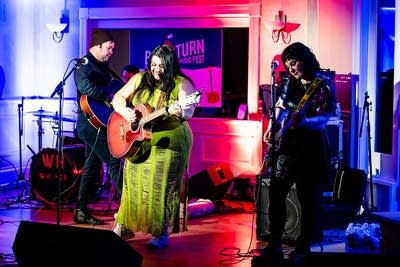 A band performing onstage