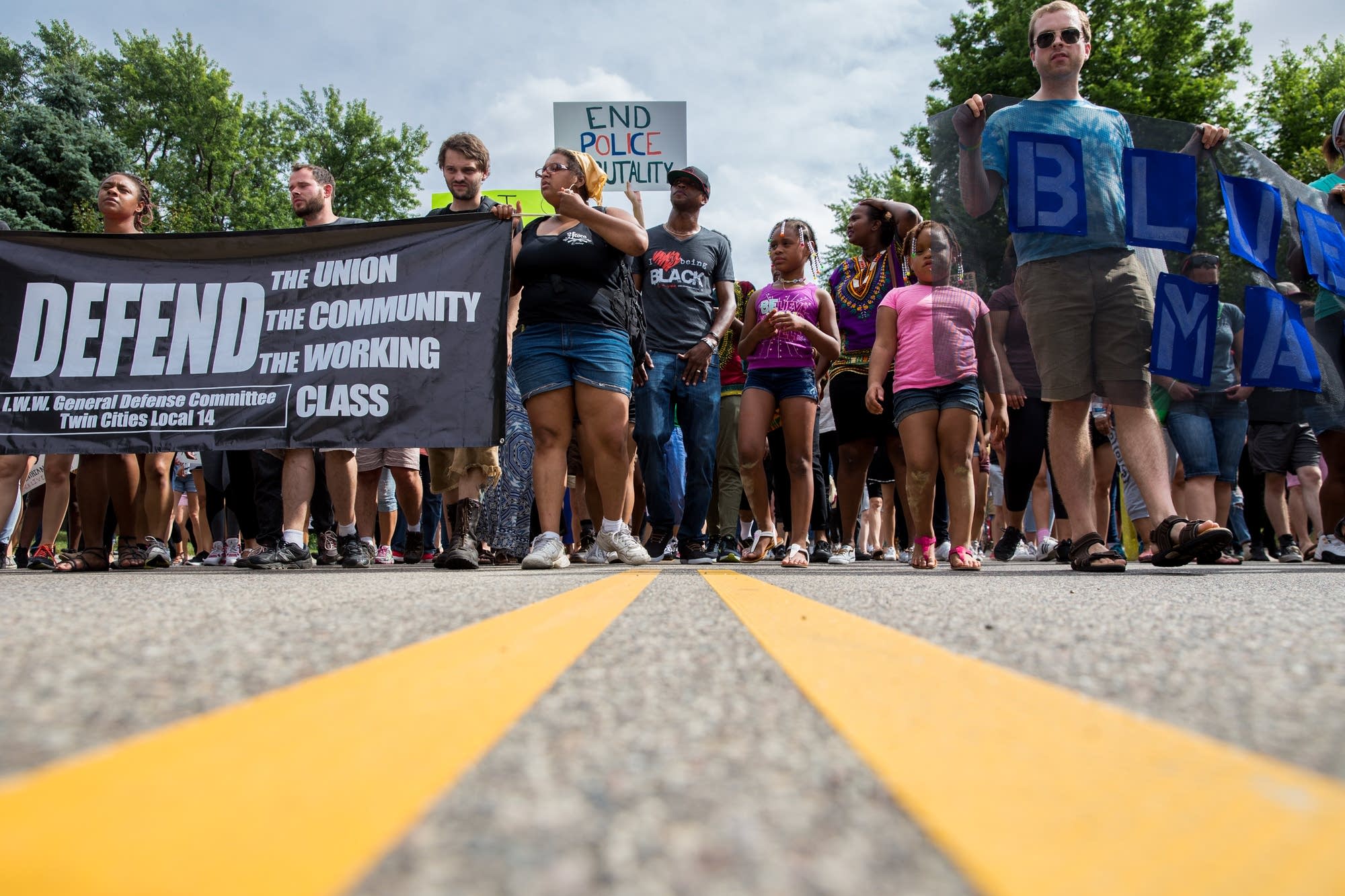 Protesters march down Silver Lake Road.
