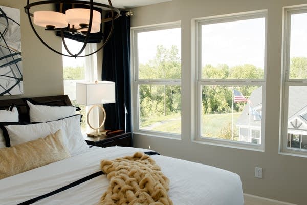 A top-floor bedroom looks out into the Brooks Ridge housing community.