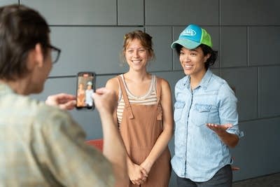 Two people are recorded speaking on video
