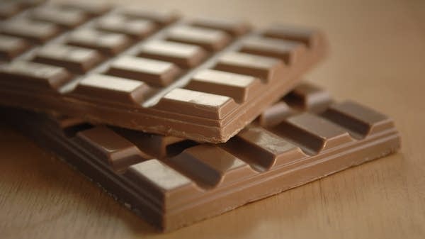 It takes roughly a quarter, give or take, to manufacture a generic bar of chocolate. 