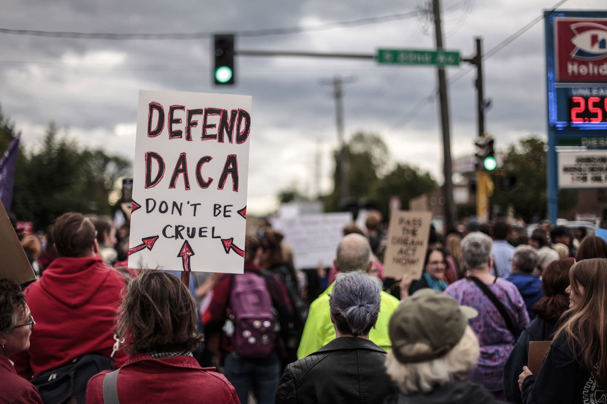 Community members fight President Trump's redaction of DACA.