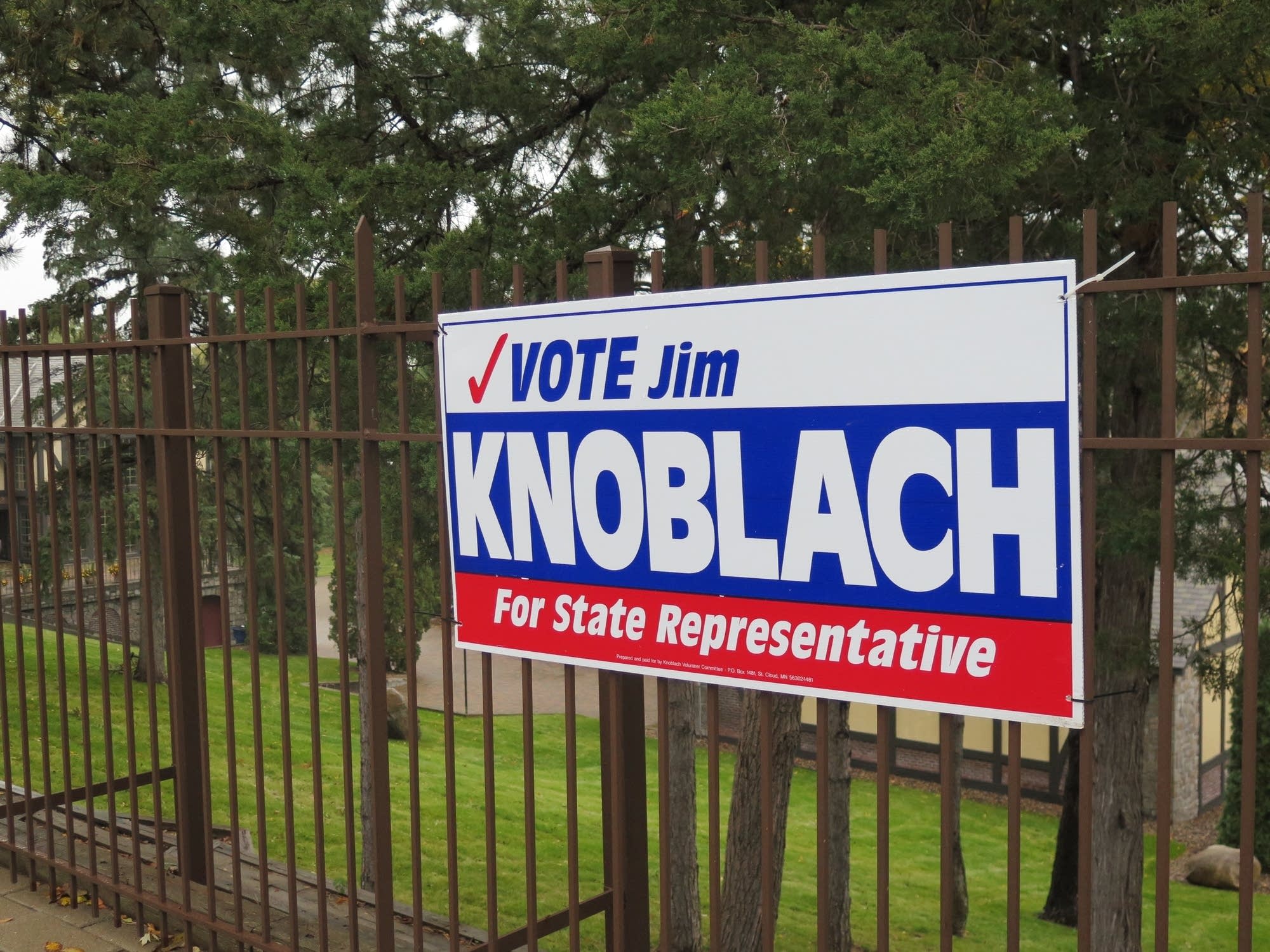 Campaign signs for Rep. Jim Knoblach.