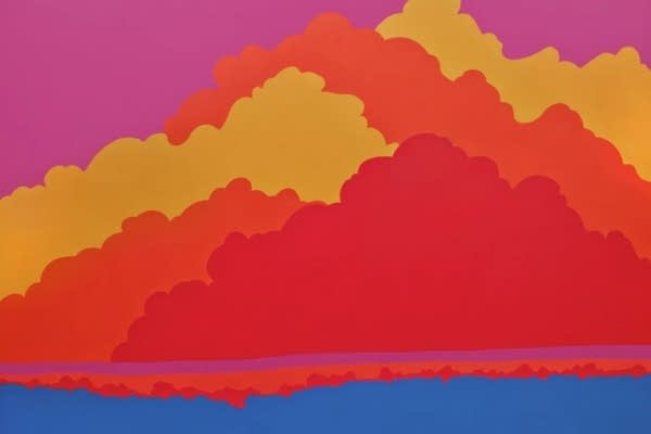 An image of red and orange clouds.