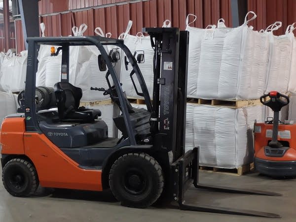 A forklift in a warehouse