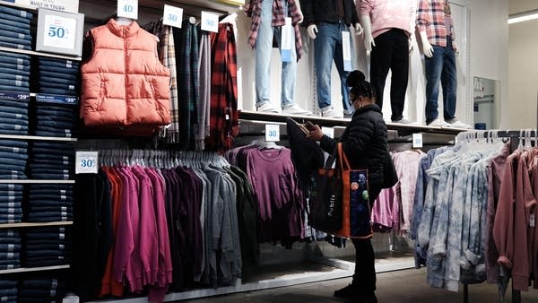Consumer spending continues to be strong — but there's a chance emerging variants could change that. 