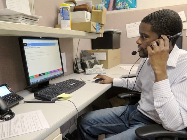 Melvin Carter, a candidate for St. Paul mayor, calls a potential voter.