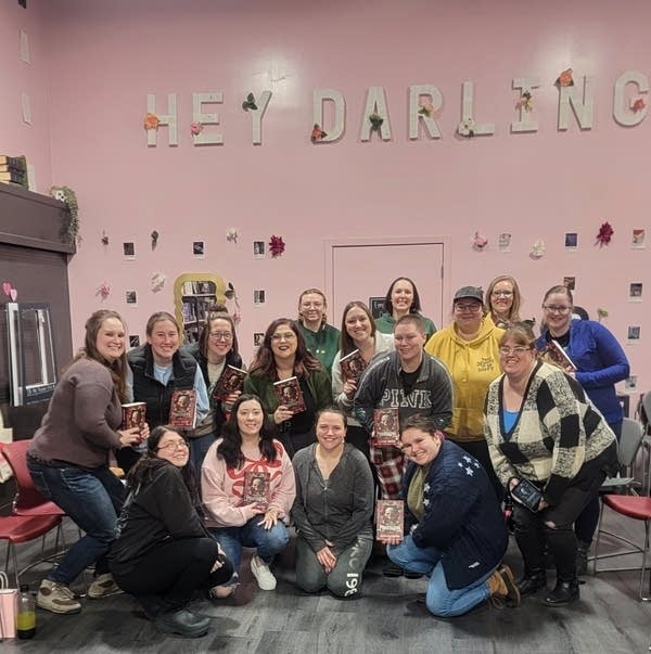 A group of people pose for a photo