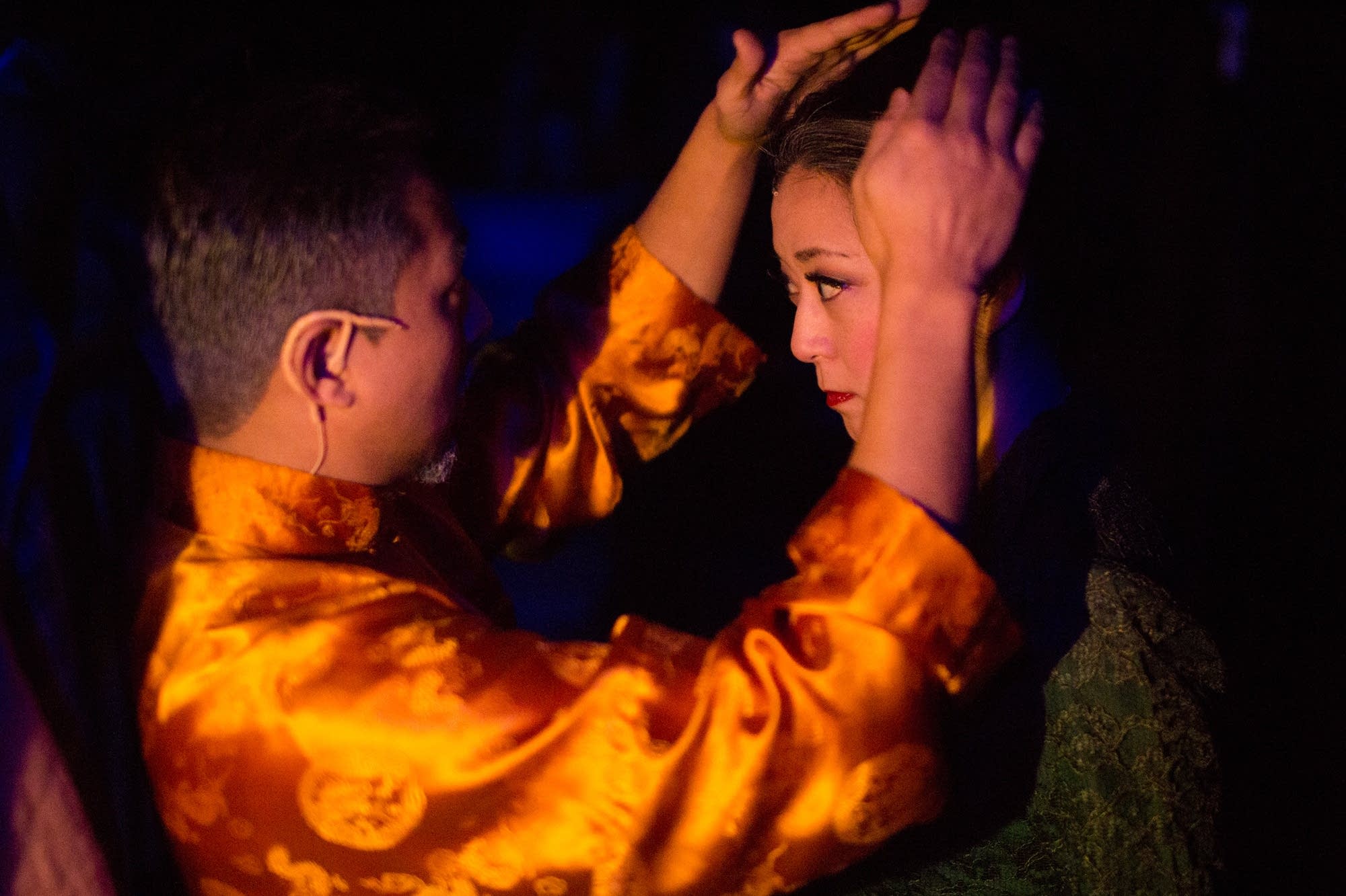 Sherwin Resurreccion helps Katie Bradley with her hair.