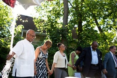 Holding hands during the benediction