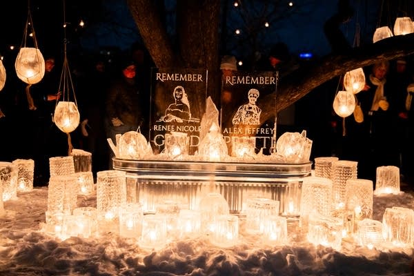 A memorial with likenesses of Renee Macklin Good and Alex Pretty are carved from ice.