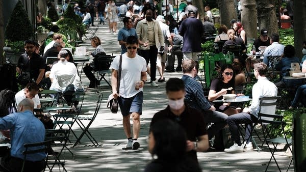 New York City is bustling again as people are free to socialize and go back to places they've missed.