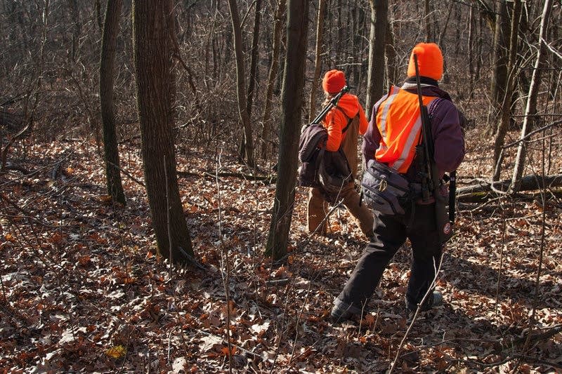 Emily Iehl and Beth Wojcik set out to find an open spot to wait for deer.