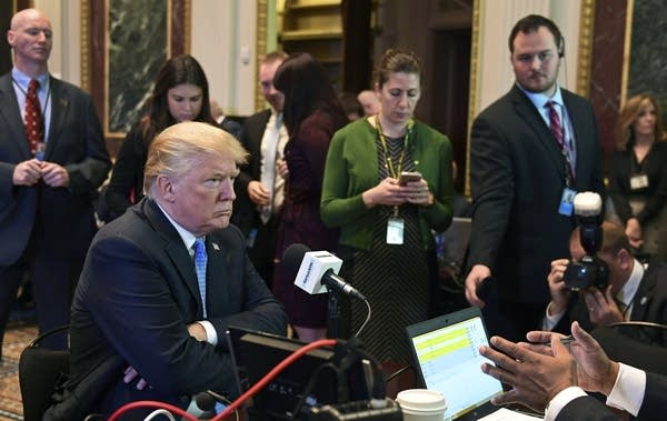 President Donald Trump sits for a radio interview.