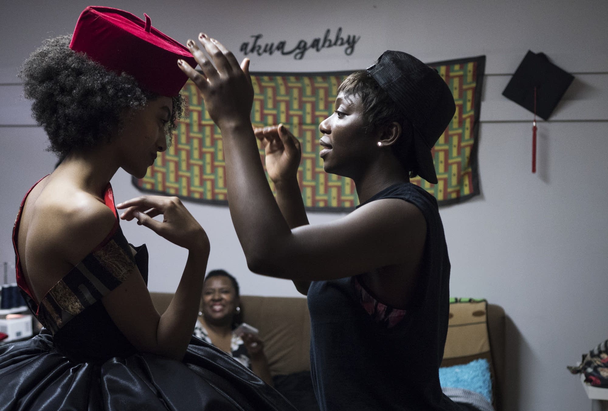 Jacqueline Addison adds a hat to one of her styles on model Lydia Negussie.