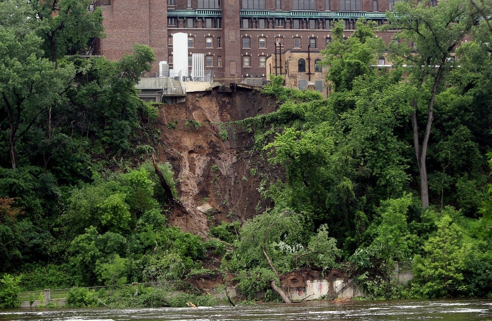 A mudslide covers West River Parkway.