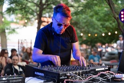 vaels performing a dj set on stage outdoors