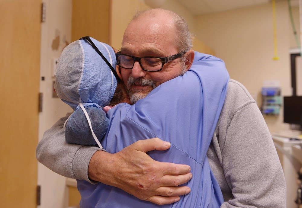 Steve Froemel meets and hugs team
